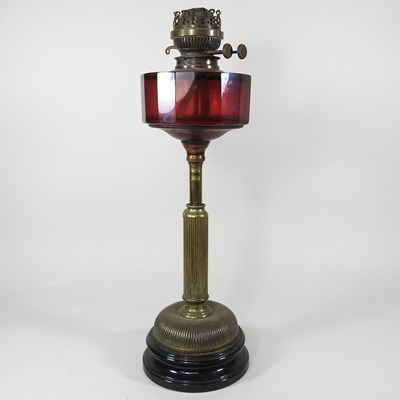 Lot 201 - A brass oil lamp