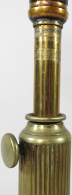 Lot 201 - A brass oil lamp