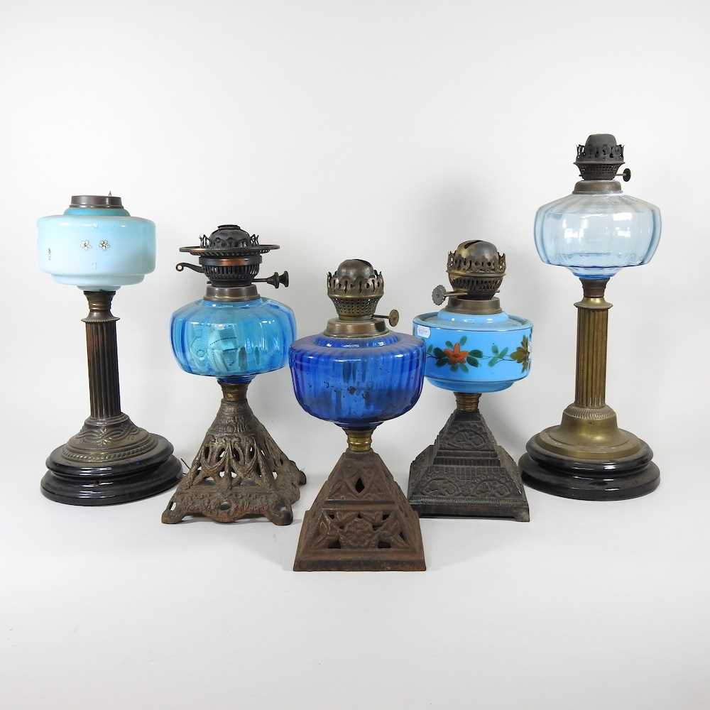 Lot 237 A collection of five oil lamp bases