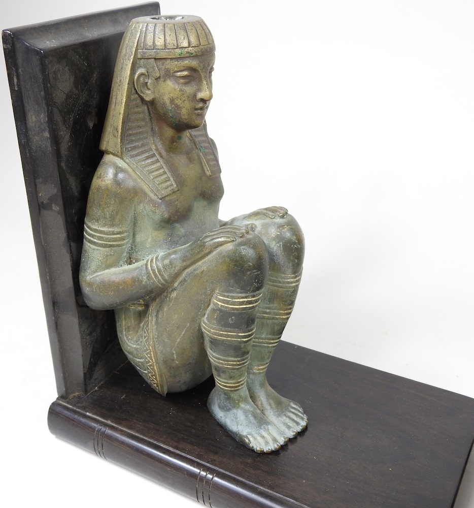Lot 43 A pair of Egyptian style bookends