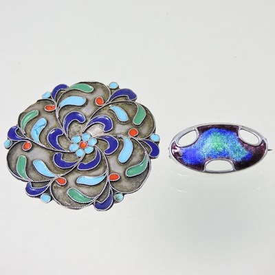 Lot 2 - A Russian style silver and enamelled brooch