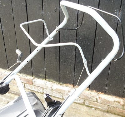 Lot 318 - A lawn mower