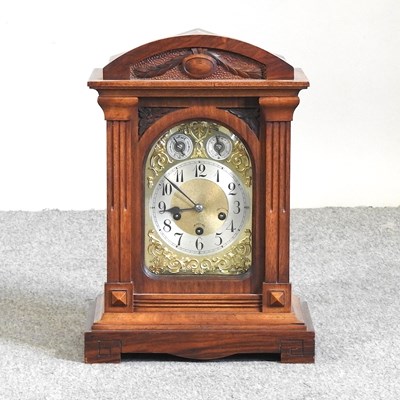 Lot 225 - An Edwardian walnut mantel clock