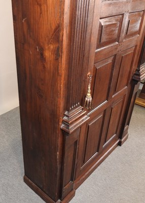 Lot 402 - An oak hall cupboard