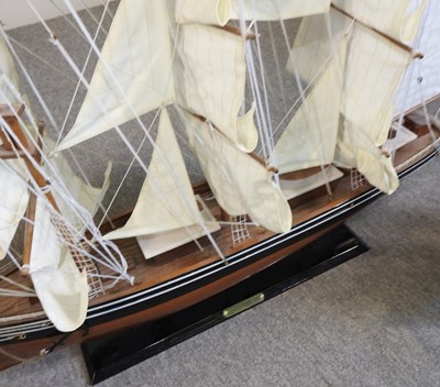 Lot 405 - A wooden model yacht