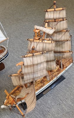 Lot 405 - A wooden model yacht