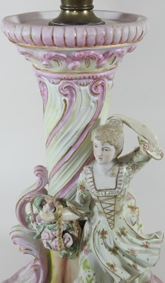 Lot 29 - A 19th century continental figural oil lamp