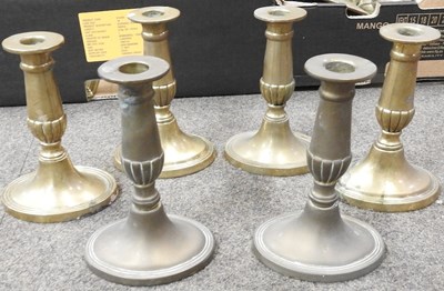 Lot 295 - A collection of brass candlesticks