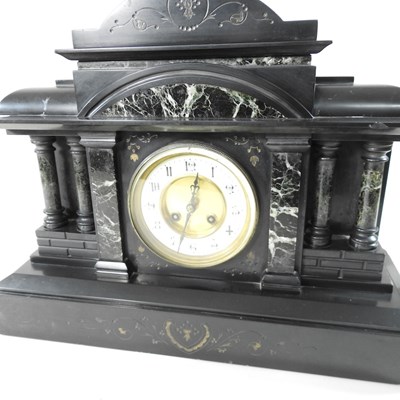 Lot 130 - A Victorian black slate mantel clock