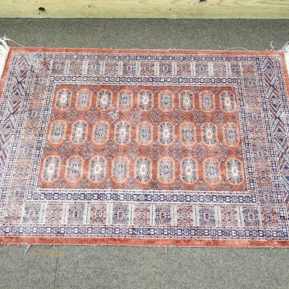 Lot 186 - A small silk rug