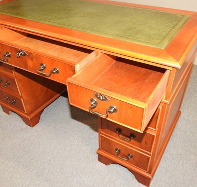 Lot 493 - A yew wood desk