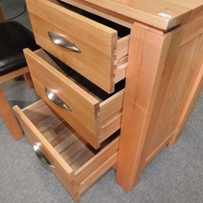 Lot 410 - A light oak dressing table