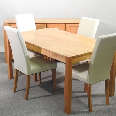 Lot 470 - A light oak dining suite