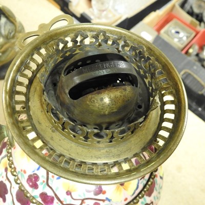 Lot 145 - A painted and brass oil lamp